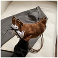 Brown crescent suede shoulder bag with a stylish polka dot dog charm detail - Brown with Pendant