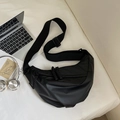 Detail of black matte nylon crescent bag with adjustable strap and woven zipper puller - Black Small