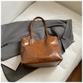Chic brown leather tote bag with embossed logo and adjustable strap for women - No Pendant / Brown