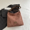Retro dark brown faux suede tote bag with adjustable wide strap and vintage leather logo - Brown