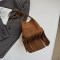Brown faux suede shoulder bag with long fringes and slender strap in bohemian style - Brown
