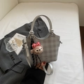 Silver-grey lattice handbag with stylish knots and a cute plush cartoon charm - Silver