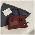 Vintage burgundy frosted leather Boston bag with decorative charms and metal base studs - Purplish Red With Charm