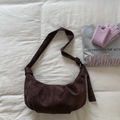 Dark brown suede dumpling bag with pleated design and knotted shoulder strap - Brown