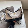 Beige quilted shoulder bag with black trim, gold twist lock and wooden bead detail - White with Pendant