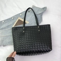 Classic black woven leather tote bag for women with large capacity and gold rivets - Black