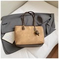 Brown and beige faux leather tote bag with shoulder straps and a cute bear charm - Brown