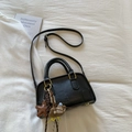 Retro black leather crossbody bag with dual handles and stylish star charm detail - Black with Pendant