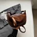 Brown vintage dumpling bag in mixed textures with shoulder strap and metal zipper - Brown