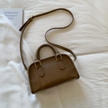 Chic vintage brown crossbody bag with smooth leather texture and golden hardware accents - Brown No Pendant