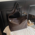 Deep brown faux leather tote bag with large capacity and matching wide shoulder strap - Brown