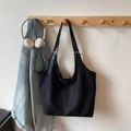 Minimalist black oversized tote bag with adjustable leather straps for daily commute - Black