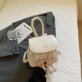 Creamy white vintage mini PU leather backpack with gold lettering and round handle - White