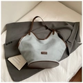 Large grey canvas tote bag with brown leather accents and brand patch detail - Light Blue Without Pendant