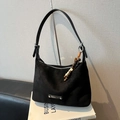 Minimalist black faux suede tote bag featuring a leather strap and wooden bead charm accessory - Black with Pendant