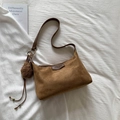 Brown suede half-moon shoulder bag with plush bear charm and leather handle - Brown