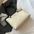 Large beige suede tote bag with black straps and golden accents for elegant commuting - With Charm / White