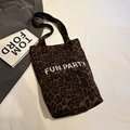Fashionable leopard print plush tote bag with FUN PARTY text for autumn casual style - Brown