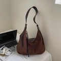 Brown faux suede underarm tote bag with long shoulder strap in a stylish indoor setting - Brown No Pendant