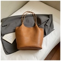 Caramel brown woven bucket bag with long shoulder straps in a minimalist casual design - Brown No Pendant