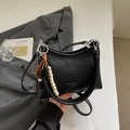 Minimalist black leather crescent hobo bag with vintage wooden bead charm and shoulder strap - Black Small