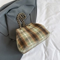 Retro green plaid woolen handbag with gold chain strap on grey blazer background - Green