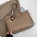 Light brown faux leather tote bag with stylish patterned scarf detail on the handle - Dark Khaki