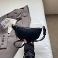 Elegante borsa a mezzaluna in camoscio nero con nodi e sottile tracolla in pelle - Nero