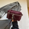 Elegant burgundy suede square crossbody bag featuring a unique silver robot metal charm - Burgundy