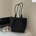 Minimalist black pebbled leather tote bag with unique knotted handles for daily commute - Black without Pendant