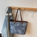 Blue denim marble pattern tote bag with brown leather straps and gold metal detail - Blue Without Charm