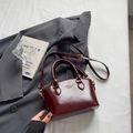 Deep red crescent handbag in glossy PU leather with double handles and gold hardware - Wine Red Without Pendant