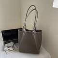 Brownish grey litchi grain leather tote bag with knotted handles and minimalist design - Grey Without Pendant