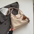 Beige large leather tote bag with bear charm and silk scarf on grey blazer background - With Charm / Off White