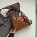 Dark brown retro crossbody bag in pebble faux leather with bear charm and tassel - With Charm / Brown