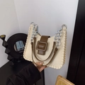 Bolso bandolera de lona crema con ribete de cuero marrón y hebilla de gran tamaño - Beige
