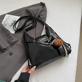 Chic black PU leather crossbody bag featuring a golden metal logo and brown plush bear charm - With Charm / Black