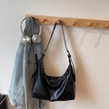 Large black vintage faux leather tote bag hanging with headphones on a wall hook - Black without Pendant