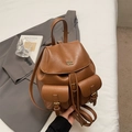 Vintage brown PU leather bucket backpack with front pockets and metallic brand logo - Brown