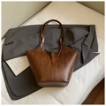 Chic brown woven tote bag with a golden buckle closure on a blazer background - No Pendant / Brown