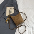 Brown quilted faux suede bucket bag with beaded tassel and adjustable leather strap - With Charm / Khaki