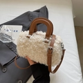 Plush cream faux fur Boston bag with brown leather straps for autumn winter styles - Cream-Brown