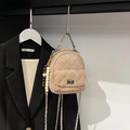 Quilted beige mini backpack with chain strap and bead charm in elegant display - Elephant Gray (With Charm)