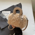 Compact beige plush faux fur boston bag with leather handles and adjustable shoulder strap - Khaki