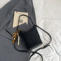 Chic black quilted bucket bag with colorful bead tassel and adjustable strap - With Charm / Black
