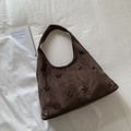 Brown suede hobo shoulder bag with floral cutout patterns in retro college style - Brown
