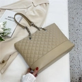 Beige quilted tote bag with diamond stitching and metal chain strap for women - Apricot