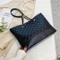 Large capacity black quilted tote bag with silver chain straps and elegant texture - Black