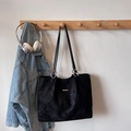 Minimalist large black tote bag with quilted diamond pattern and golden metal accent - Black without Pendant