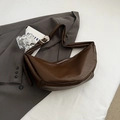 Deep brown faux leather hobo bag with adjustable silver buckle in a retro style - Brown